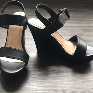 Black wedge sandals